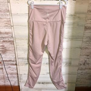 Pink Nike leggings athletic wear velvet sides size small side ways Nike symbol‌
